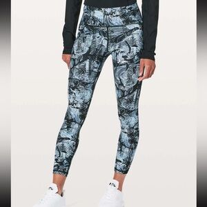 NWOT lululemon leggings, size 2, multi print with mesh detailing.